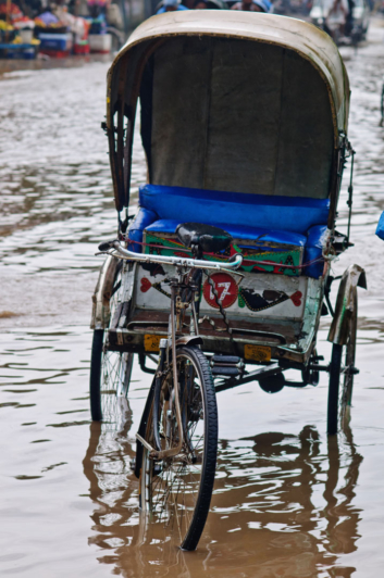 A rickshaw stranded in water