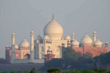 The taj mahal viewed from a distance.