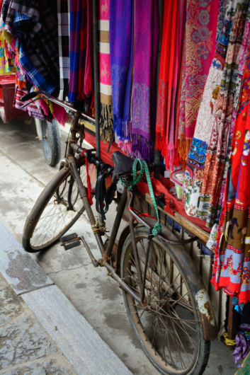 Chinese market bicycle with hanging clothes