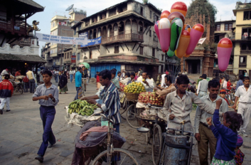 Balloon and fruit salesmen in Kathmandu.