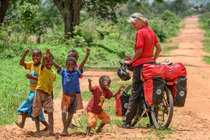 Meeting kids while cycling Africa