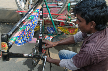 A Dhaka rickshaw mechanic.