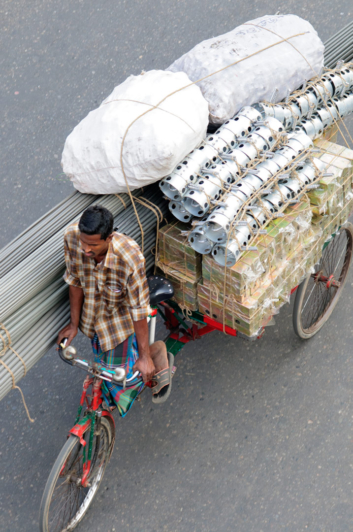 Looking down on a fully-loaded rickshaw.