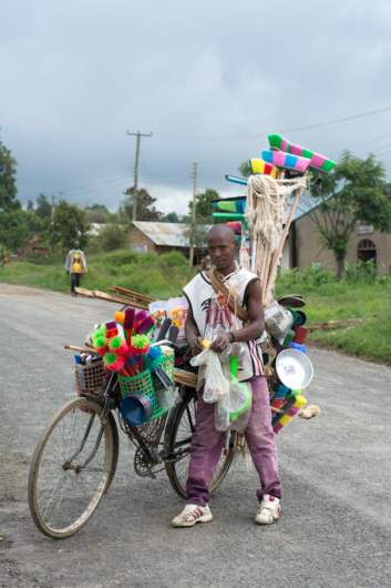 africa-cycling-broom-salesman